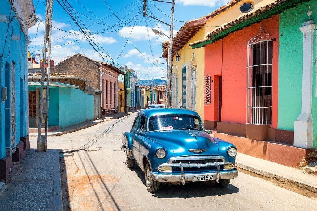Street in Trinidad with vintage car